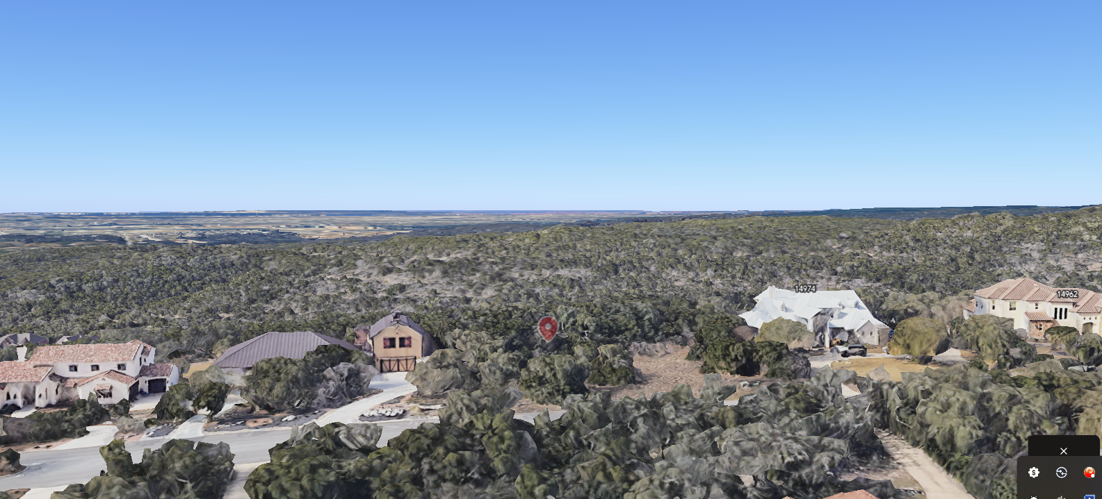 Aerial view from 14986 Iron Horse Way (marked) looking out over the Government Canyon State Natural Area, with unbroken Hill Country stretching to the horizon